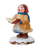 Village de Noël miniature, fillette chantant Noël