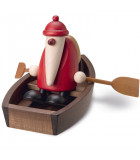 Père Noël en bois sur une barque 