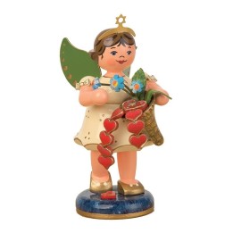Figurine ange de Noël et petits coeurs rouges