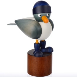 Jolie mouette en bois avec un bonnet bleu