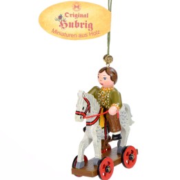 Noël d'antan, enfant sur un cheval de bois, 