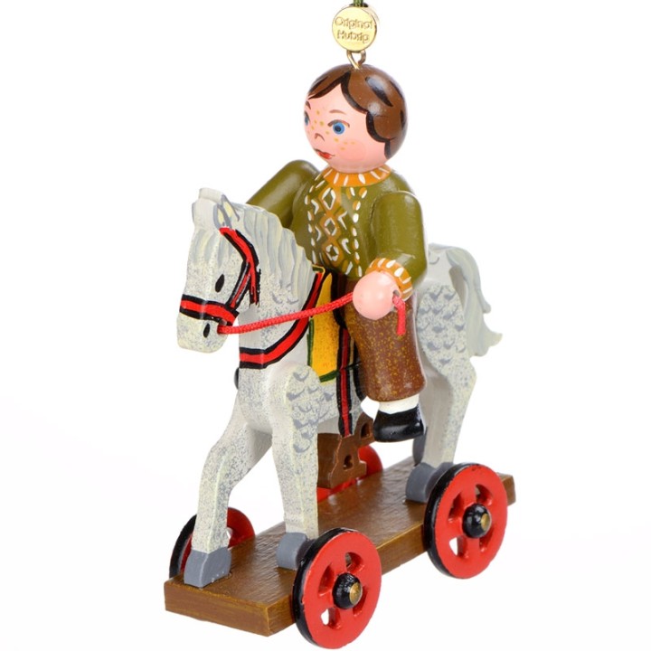 Noël d'antan, enfant sur un cheval de bois, 