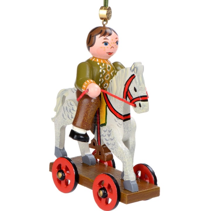 Noël d'antan, enfant sur un cheval de bois, 