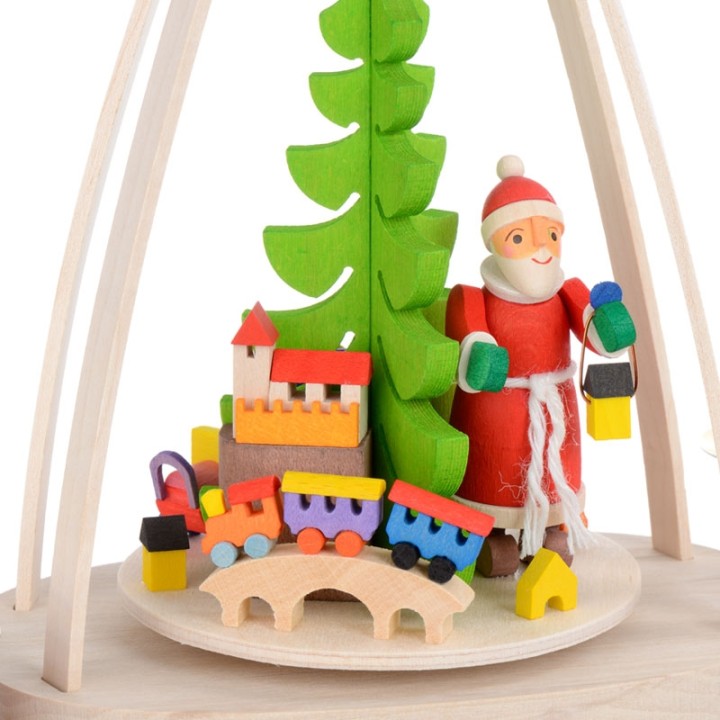 Manège de Noël à bougies cadeaux et père Noël