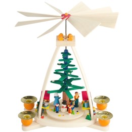 Manège de Noël à bougies au pied du sapin
