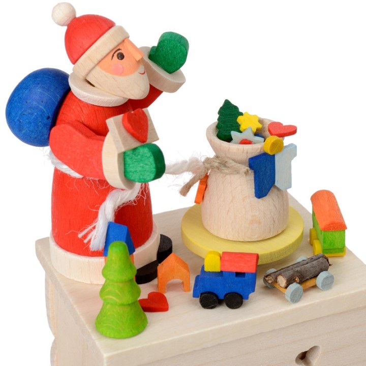 Boite à musique enfant à manivelle, père Noel et jouets