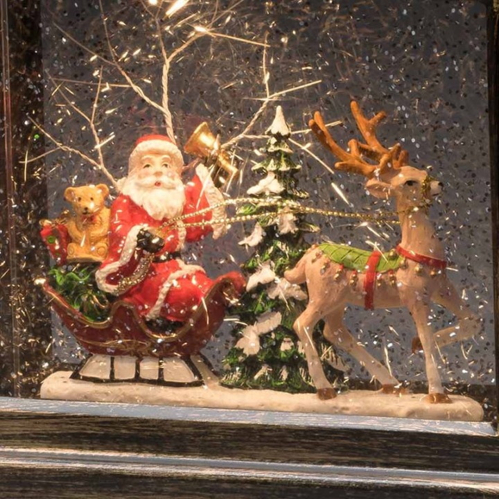 Lanterne à neige à LED avec  père Noël dans son traîneau, 25 cm