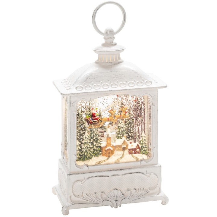 Lanterne de Noël blanche, père Noël volant au-dessus d'un village