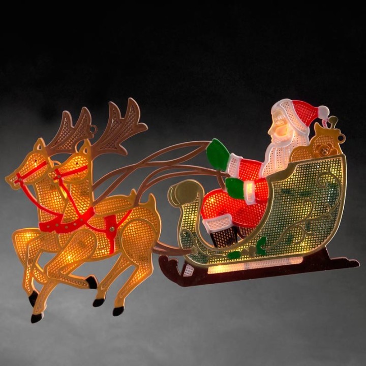 Père Noël lumineux avec traineau et rennes 