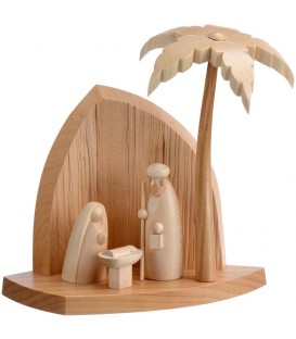 Crèche en bois avec un palmier et la nativité
