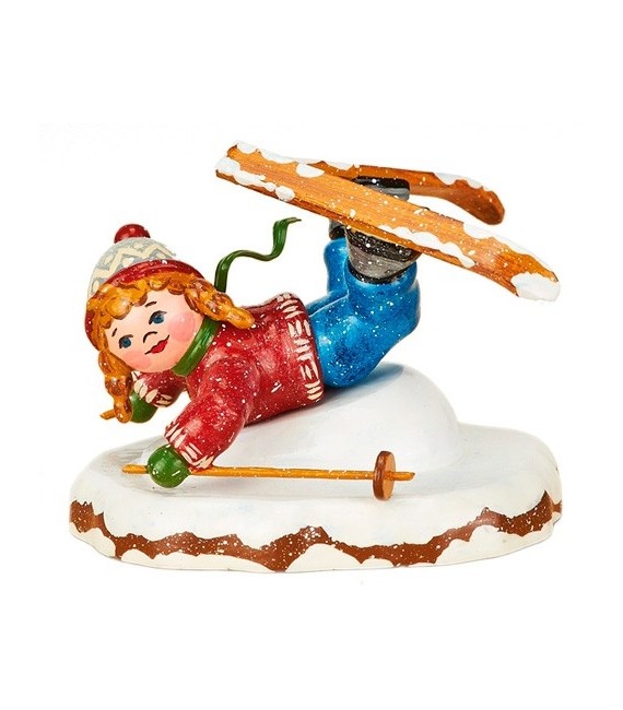 Village de Noël miniature, fillette chutant à ski
