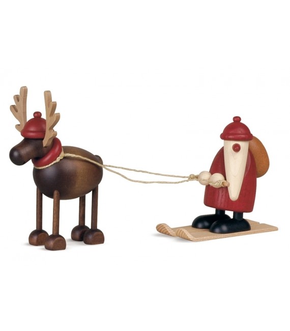 Père Noël en bois sur ski et renne
