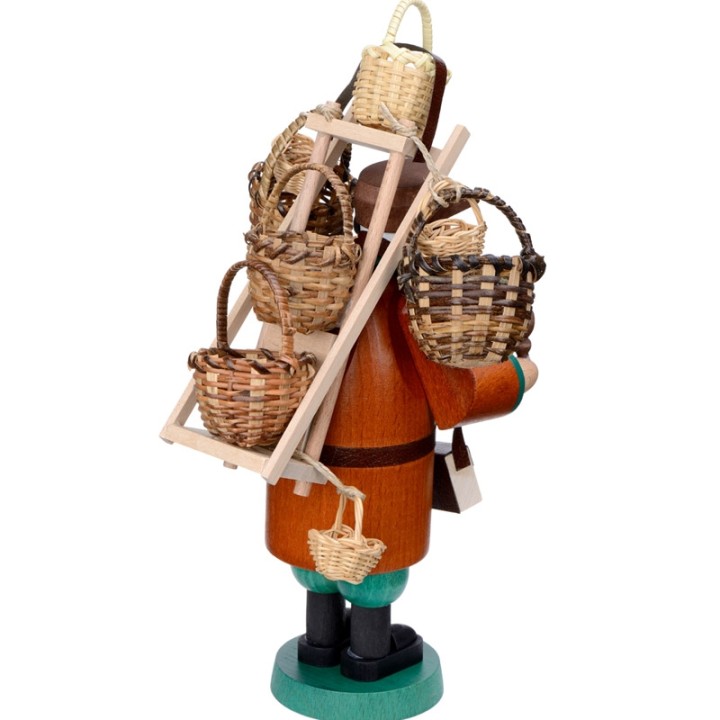 Personnage brûle-encens vendeur de paniers