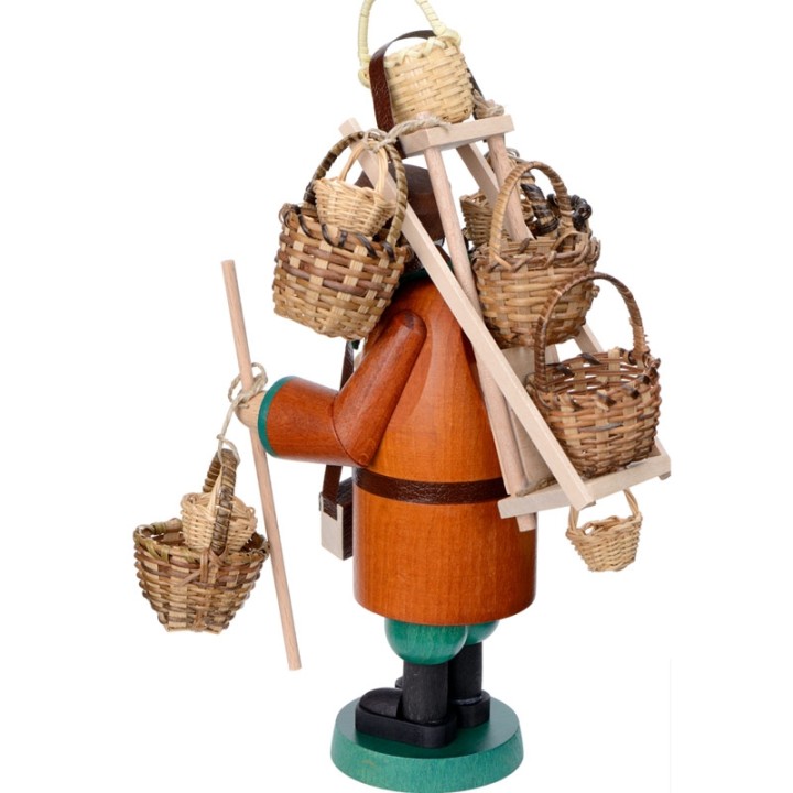Personnage brûle-encens vendeur de paniers
