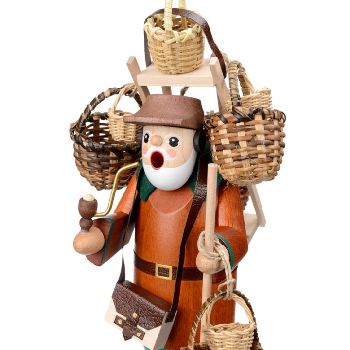 Personnage brûle-encens vendeur de paniers