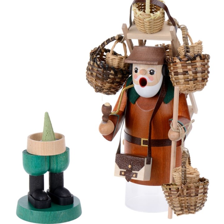 Personnage brûle-encens vendeur de paniers