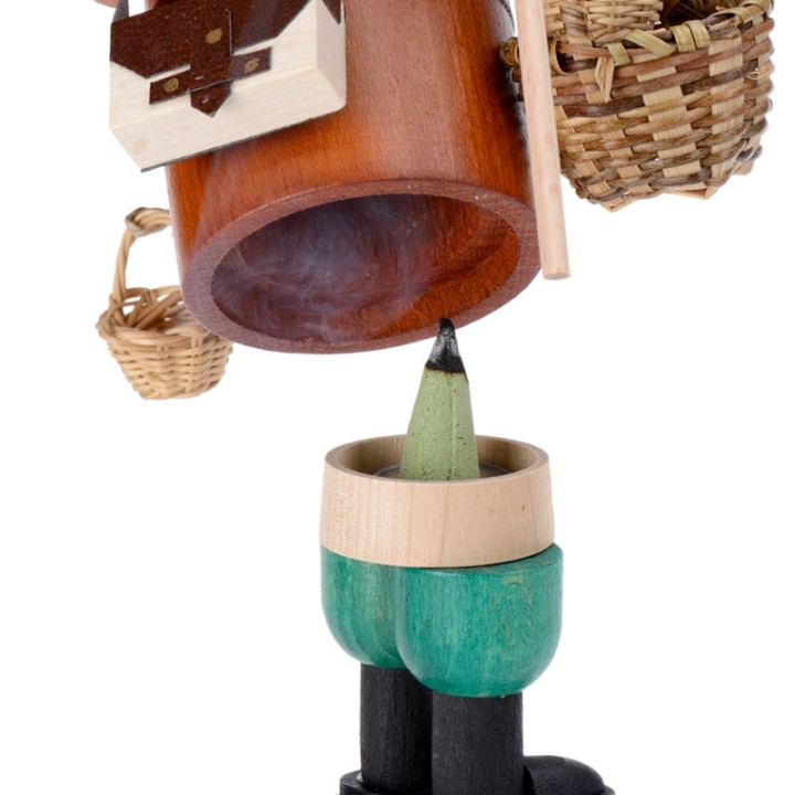 Personnage brûle-encens vendeur de paniers
