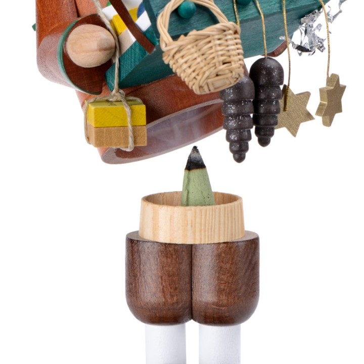 Personnage brûle-encens vendeur de déco de Noël