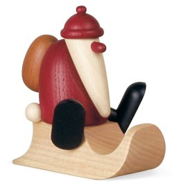 Père Noël rouge sur une luge