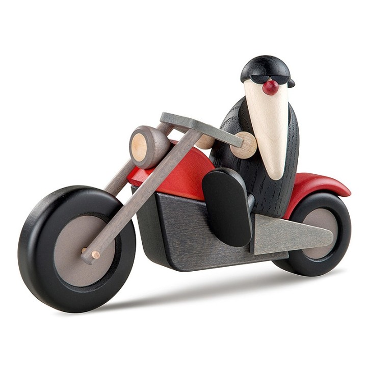 Père Noël moderne à moto au look rocker