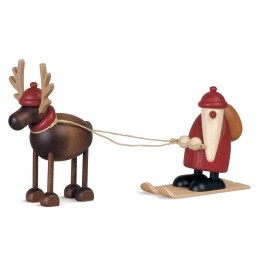 Père Noël en bois sur ski et renne