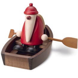 Père Noël en bois sur une barque 
