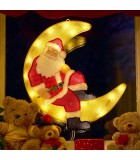 Père Noël lumineux sur la lune