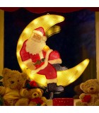 Père Noël lumineux sur la lune