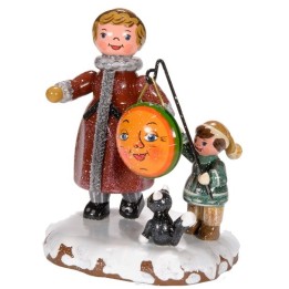 Village de Noël miniature, maman et fillette