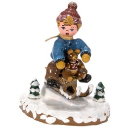 Village de Noël miniature, garçon sur la luge