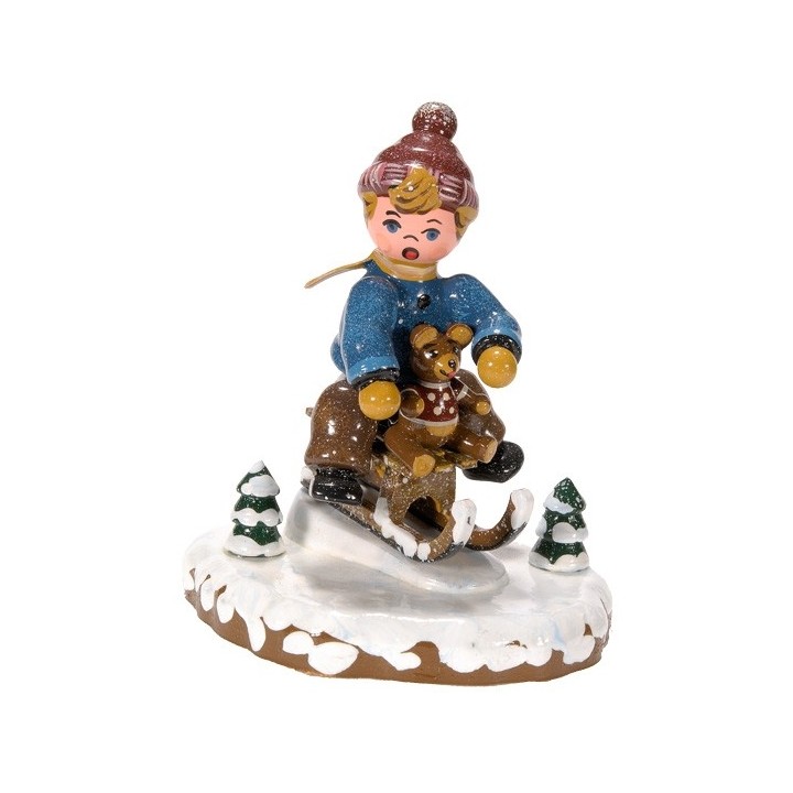 Village de Noël miniature, garçon sur la luge